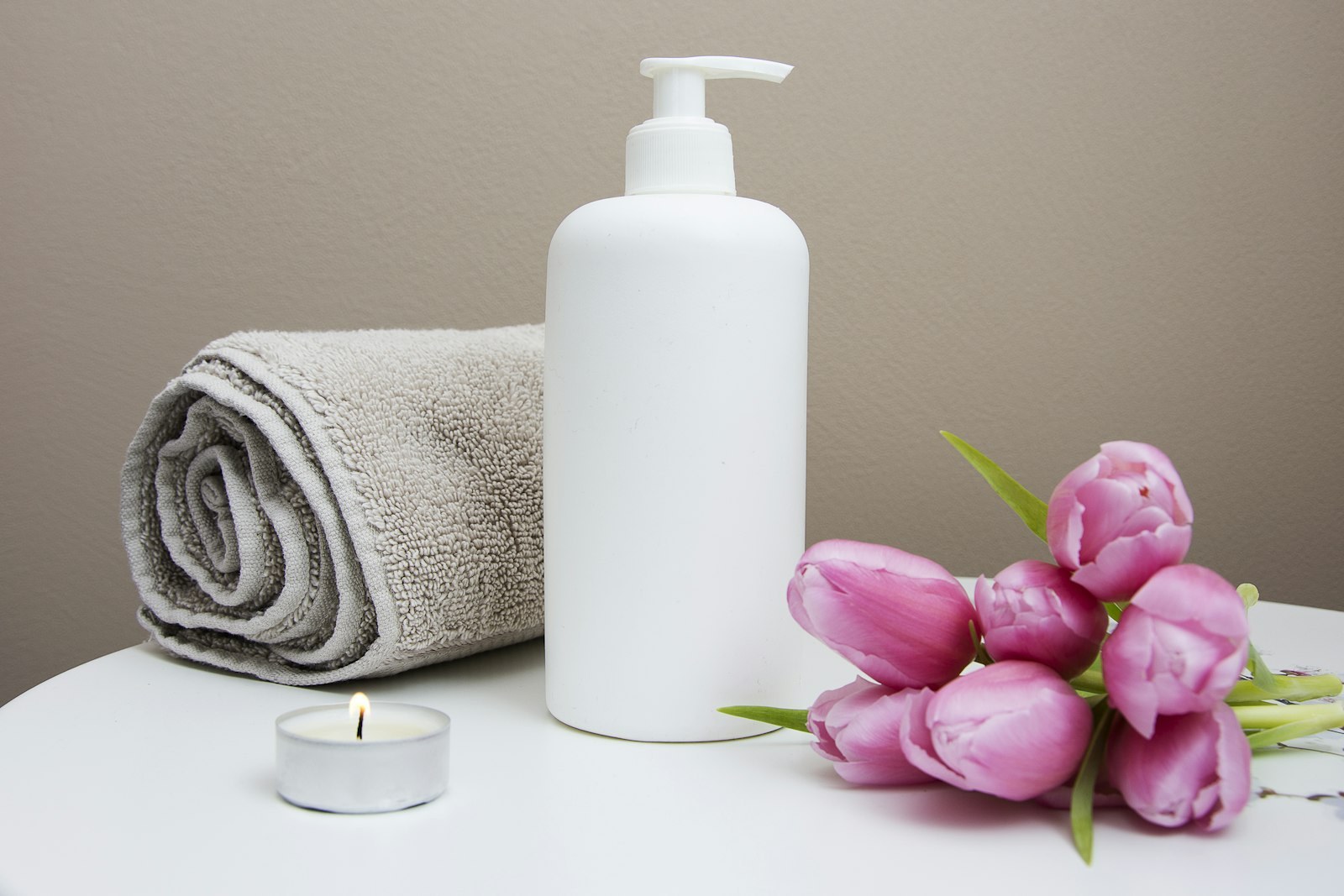 Warm oil poured for a spa treatment at Optionventurebeam's wellness rooms